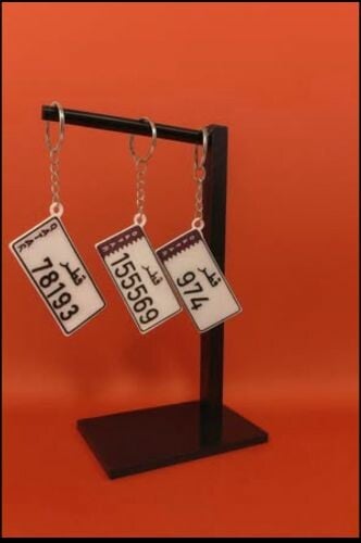 تصميم ميداليات مفاتيح على شكل لوح