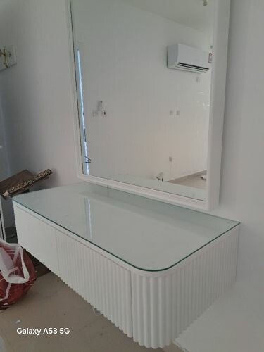 Bedroom dresser with mirror and l