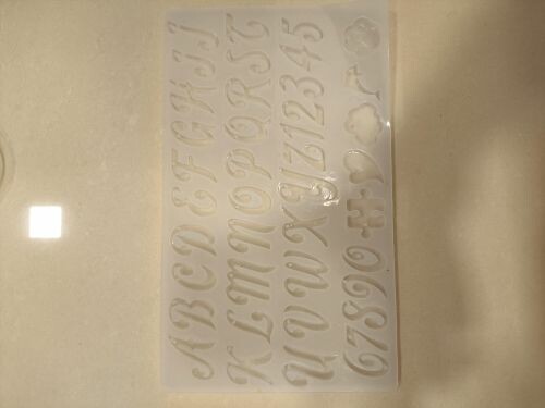 Resin mold in the shape of letter