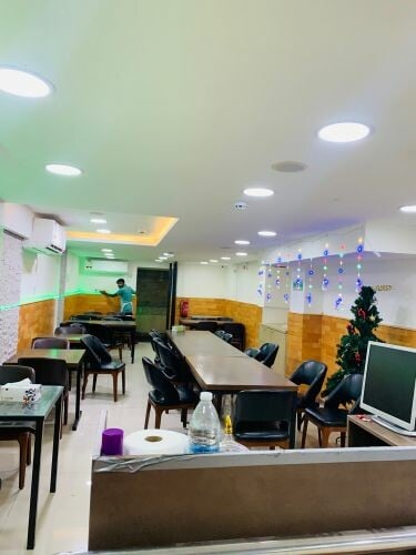 Asian female waiter needed.