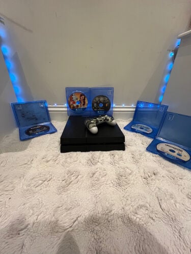 PlayStation 4 with 5 Games