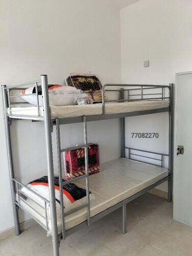 Silver double bunk bed for sale.
