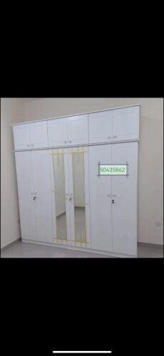 New six doors wardrobe with top