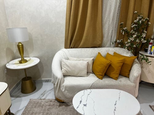 A new sofa, table, and rug