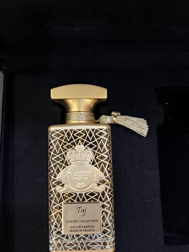 عطر تاج من الجزيرة 
