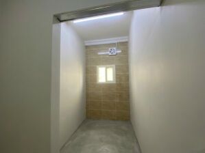 شقة غرفة و صالة بالثمامة شاملة