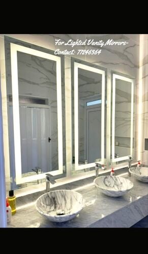 أعمال الألمنيوم والزجاج.