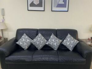 IKEA black leather sofas