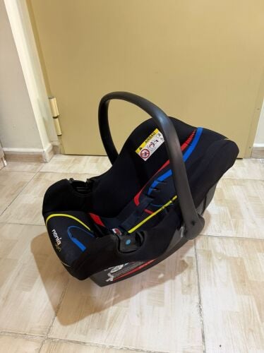 nania car seat and rocking chair