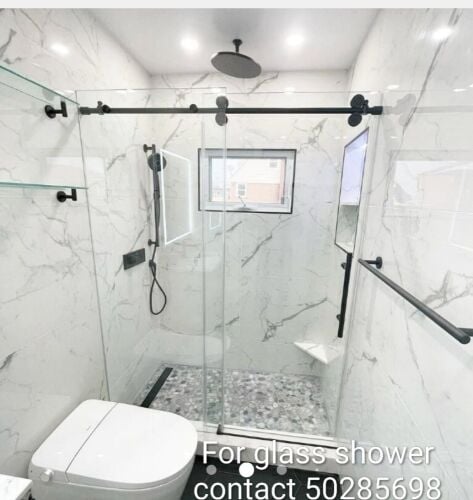 أعمال الألمنيوم والزجاج.