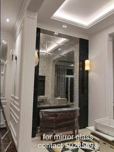 أعمال الألمنيوم والزجاج.