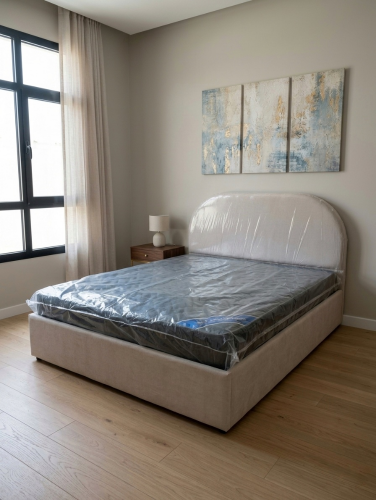 Queen size bed and spring mattress.
