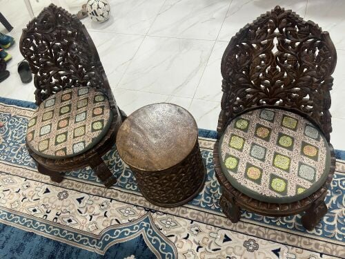2 chairs with table