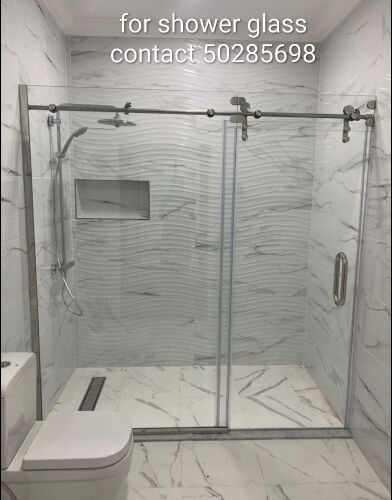 أعمال الألمنيوم والزجاج.