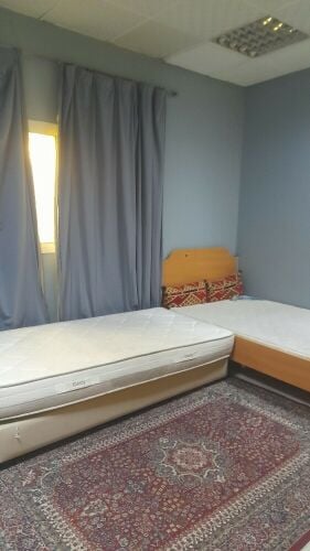 2 single beds w/ curtains