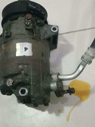 Ac compreesor original Tida