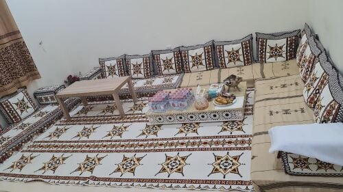 عز