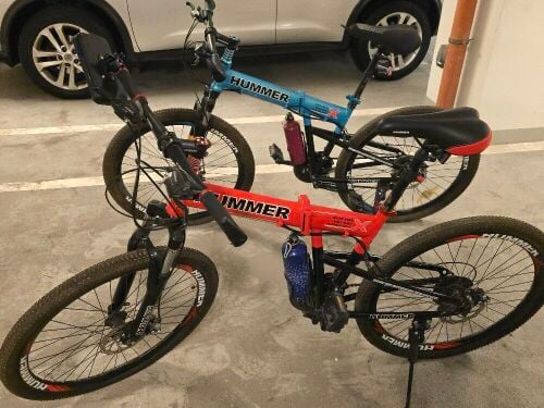 2xHummer bikes with helmets