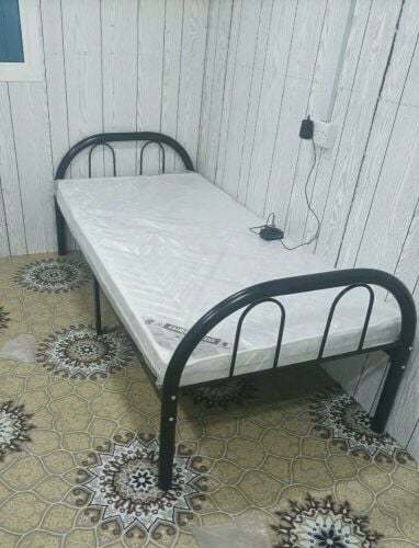 New black single bed frame