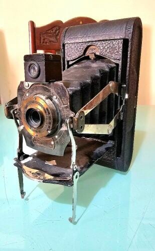 old antique folding camera