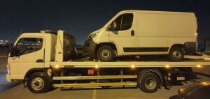 Car towing near by