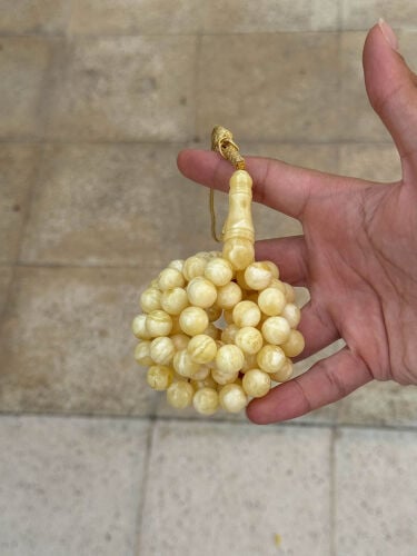 مسباح كهرم مبرقع بياض معجن