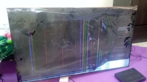 Broken TV, spare parts, and a repai