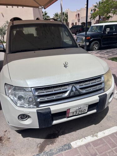 Pajero 2010 + Special Plate 13250