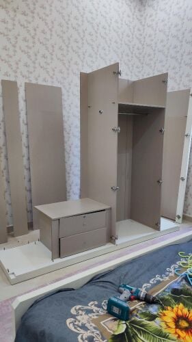 نجار فك وتركيب غرف النوم والستائر