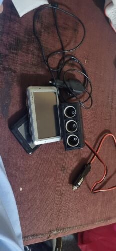 2 garmin nuvi with 3 holder plugs