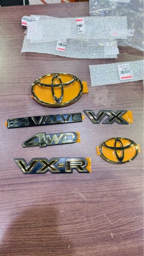 land cruiser 1997 logo gold