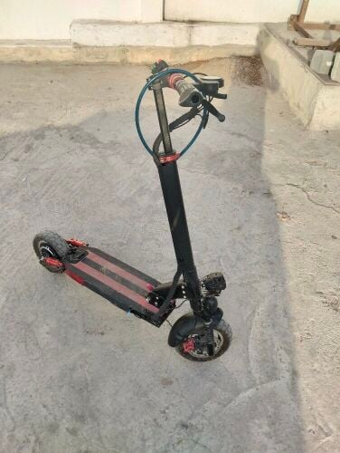 The scooter's lights and brakes are