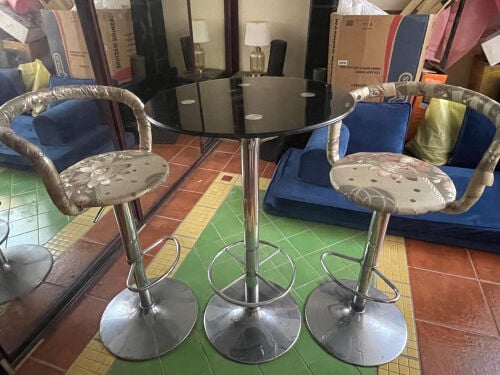 Table with swivel chairs