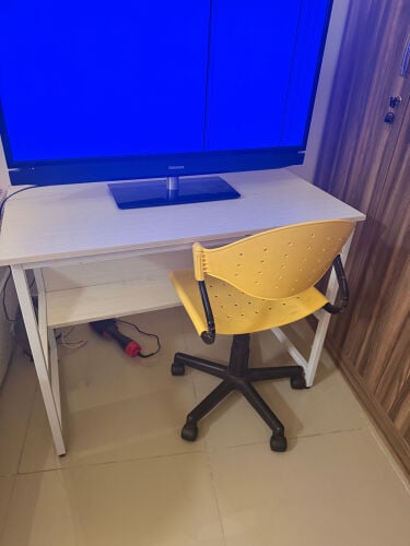 Desk, TV screen, and chair