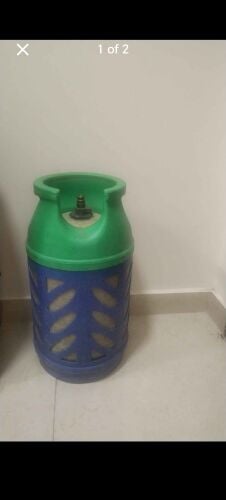 Gas cylinder, pipe, regulator, stov