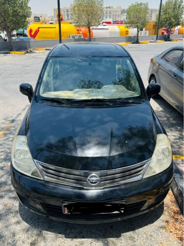 Nissan tida (hatchback) 2013