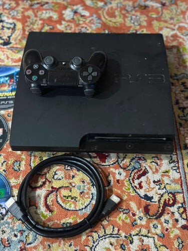 ps3 with cds and controller 