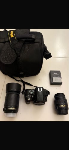 Nikon D3300 DSLR with 2 lenses.