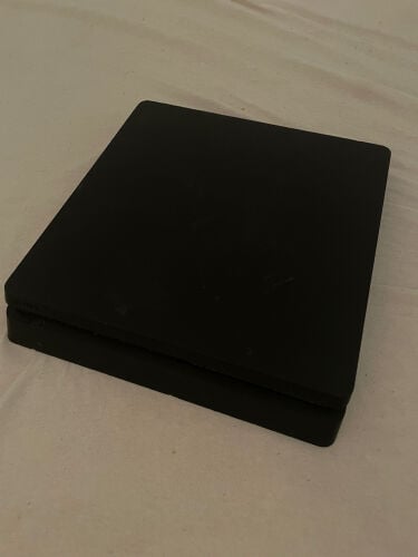 PS4 with controller 