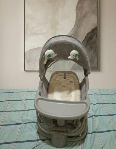 Juniors electric baby swing