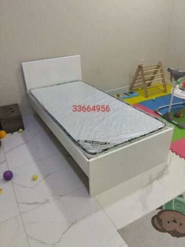Wooden single bed. cabinet