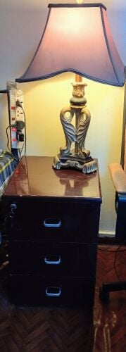 The-drawer cupboard, table lamp