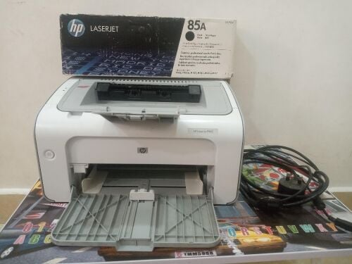 hp laserjet p1102 black and white with new inc jet in very good condition
