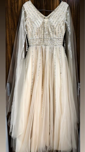 ‏ off-white evening gown 