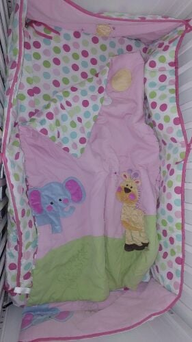 baby cot with matress and bed sheet
