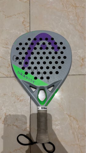 two new barley used paddle racket