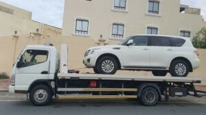 Car towing near by