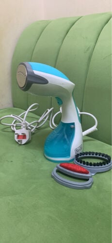 مكواة بخار يدوية للملابس 