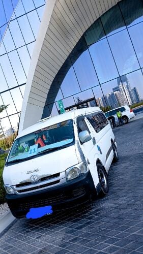 bas Toyota for rent with driver