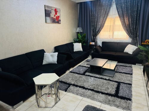 Living Room with Table and Carpet